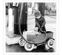 Holy Mackerel filling up with petrol retro black and white photographic card featuring a vintage image of a child with a toy car - 15cm square and blank inside