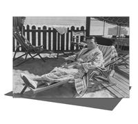 Holy Mackerel Handsome man reading vintage photographic card featuring an image of elegant seaside relaxation, early 20th century - 12.6 x 17.7cm and blank inside