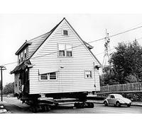 Holy Mackerel house on the move retro black and white photographic card featuring a vintage image of a building being transported - 12.6 x 17.7cm and blank inside