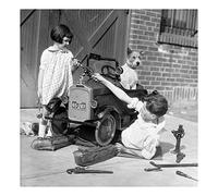 Holy Mackerel mechanic's assistants retro black and white photographic card featuring a vintage image of children and a dog mend a toy car - 15cm square and blank inside