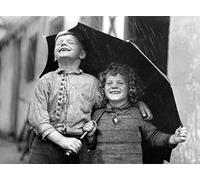 Holy Mackerel taking cover retro black and white photographic card featuring a vintage image of laughing children sharing an umbrella in the rain - 12.6 x 17.7cm and blank inside