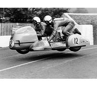 Holy Mackerel TT racers retro black and white photographic card featuring a vintage image of a motorbike leaving the ground - 12.6 x 17.7cm and blank inside