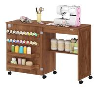 HOMCOM Folding Sewing Table Rolling Craft Table for Small Spaces Brown | Storage Compartments, Shelf, Lockable Castors