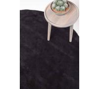 Homescapes Hand Tufted Plain Cotton Large Round Rug In Black Black 150cm diameter