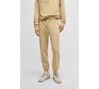 HUGO Cuffed tracksuit bottoms in cotton terry with logo print - Style Dayote232, 50489617 Light Beige S