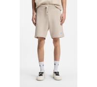 HUGO Loose-fit shorts in a waffle-structured cotton blend - Style Nuwafflo, 50534451 Light Beige XS