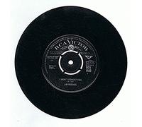 I Won't Forget You / A Stranger's Just A Friend