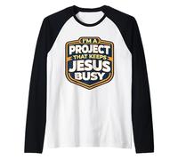 I'm A Project that Keeps Jesus Busy Funny Christian Christ Raglan Baseball Tee
