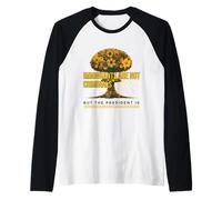 Immigrants Are Not Criminals But The President Is Floral Raglan Baseball Tee