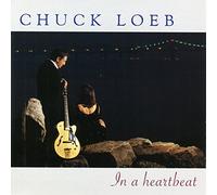 In a Heartbeat by CHUCK LOEB (2001-02-13)