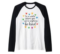 in A World Where You Can Be Anything Be Kind Autism Raglan Baseball Tee