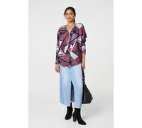 Izabel London Geo Print Zip Front Relaxed Top for Women UK with Long Sleeves and a Curved Thigh Length Hem.