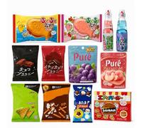 Japanese Snack Bundle, includes 12 assorted treats: candies, chocolates, potato chips and soda beverages. Fun genuine Japanese food set, ideal as a gift.