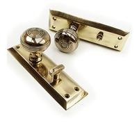 Jones & Grey Bellport New York Solid Antique Brass Round Knobs Door Handles on Bathroom Privacy Backplate