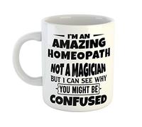 Just The Shirt I'm an Amazing Homeopath Not a Magaician But I can See Why You Might Be Confused White Ceramic Hand Printed Mug