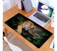 KDWJS Gaming Mouse Pad Mouse Mat - 35.5 x 16 in - XXL mousepad - Table mat large size - improved precision and speed - Animal, a wild Bengal tiger, crosses leaves, staring at the lush green habitat