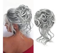 KETHBE 1.Elegant Design:This messy curly bun with some loose strands of long and wavy hair looks soft and spirited when you wear it.