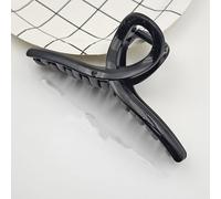 Large black hair clip with a simple and versatile design, featuring a shark shaped headband at the back of the head