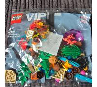 LEGO 40607 6+ 120 Pieces Summer Fun VIP Add-On Pack Cool Polybag With Random Fun Bricks and Pieces Including Pizzas, Fish, Santa Hat, Surfboard, Snakes and an Umbrella