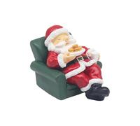 Lesser & Pavey Santa relaxing in a chair with mince pies