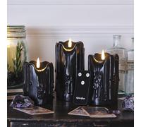 Lights4fun Set of 3 TruGlow® Battery LED Flameless Pillar Candles Heavy Dripping Black Real Wax with Timer and Remote Control Indoor Use