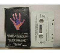 Living in the Material World [CASSETTE]