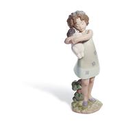LLADRÓ Learning To Care Girl Figurine. Porcelain Figure Figure.