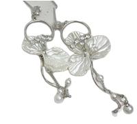 Long silver-plated drop earrings, featuring a white petal, a faux-pearl tassel, and pave-set cubic zirconia-soft and elegant jewelry for women.