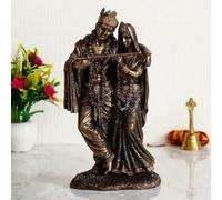LOTUSAMAR A beautiful and intricate Bronze statue depicting Radha and Krishna, two central deities in Hinduism
