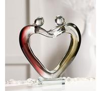 love sculpture in purple and smoky glass