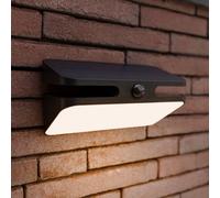 LUTEC AERO LED solar-powered outdoor wall lamp, black, 21 cm, sensor, IP54