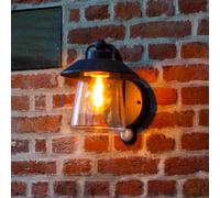 LUTEC CATE sensor-activated outdoor wall light, black, 22 cm, IP44, E27