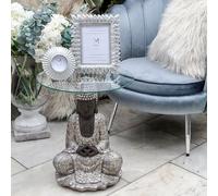 Madison & Mayfair Silver Sitting Buddha Side Table with a Clear Glass Top Madison & Mayfair Silver