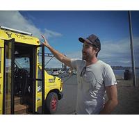Man Converts School Bus into Tiny Home Adventure Vehicle