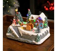 Marco Paul Animated See-Saw Christmas Village Scene - Large 15cm Musical Christmas Ornaments with Multi-Coloured LED Lights - Battery Operated Light Up Xmas Ornaments