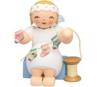 Marguerite Angel,Sitting, with Advent Calendar