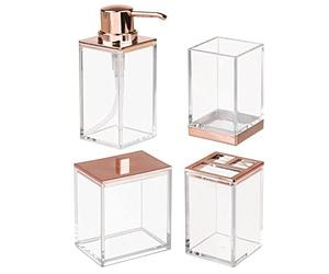 mDesign Plastic Bathroom Vanity Countertop Accessory Set - Includes,Soap Dispenser, Toothbrush Holder, Lidded Canister, and Tumbler Rinsing Cup; Lumiere Collection - Set of 4 - Clear/Rose Gold