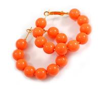 Medium Size Orange Acrylic Bead Hoop Earrings in Gold Tone - 40mm Diameter