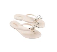 Melissa Harmonic Eclipse Womens Fashion Sandals - Dressy Flip Flops with Metallic Bow - Lightweight PVC, Flexible Design - Summer Sandals for Women, Flat & Flexible, Iris - Beige/Gold, 7