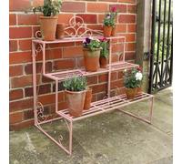 Melody Maison Pink Metal Three Tier Plant Theatre Stand