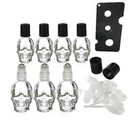MINELEVEN 7pcs Set 10ml Mini Skull Glass Oil Roll Bottles Leakproof Essential Oils Bottle for Storage and Travel (transparent)