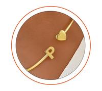 MYDYYO A gift for a young girl - an open, gold-colored, heart-shaped bracelet adorned with the letters (A-Z).