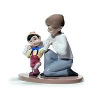 NAO Pinocchio's First Steps. Decorative Figurine of a Boy and Pinocchio in Gloss Porcelain. Ornamental Children’s Sculpture with the Famous Disney Character to Celebrate the Magic of Childhood