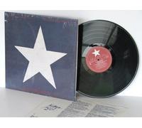 NEIL YOUNG - NEIL YOUNG Hawks and Doves In shrink but opened with tax cut on spine. With inner lyric sleeve. US pressing. 1986.