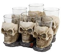 Nemesis Now Six Shooter Skulls (Set of Six) Shot Glasses 14cm Ivory | Six glass shot glasses in sculpted skull holders on a stone-look display base