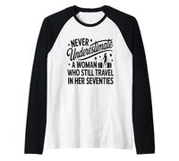 Never Underestimate a Woman who Still Travels in her 70's Raglan Baseball Tee
