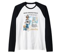 Never Underestimate a Woman Who Still Travels in Her 70's Raglan Baseball Tee
