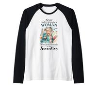 Never Underestimate a Woman Who Still Travels in Her 70's Raglan Baseball Tee