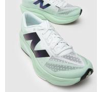 New Balance Women's FuelCell Rebel v4 in Green/White/Black Synthetic, size 4 Narrow