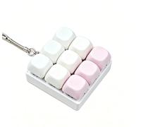 New Nine-key Keyboard Decompression Toys, Milk Theme Color Matching 2.0 Series Toy Key Chain Compression Button Finger Clicker Gift To Relieve Stress(Polvo de fresa)